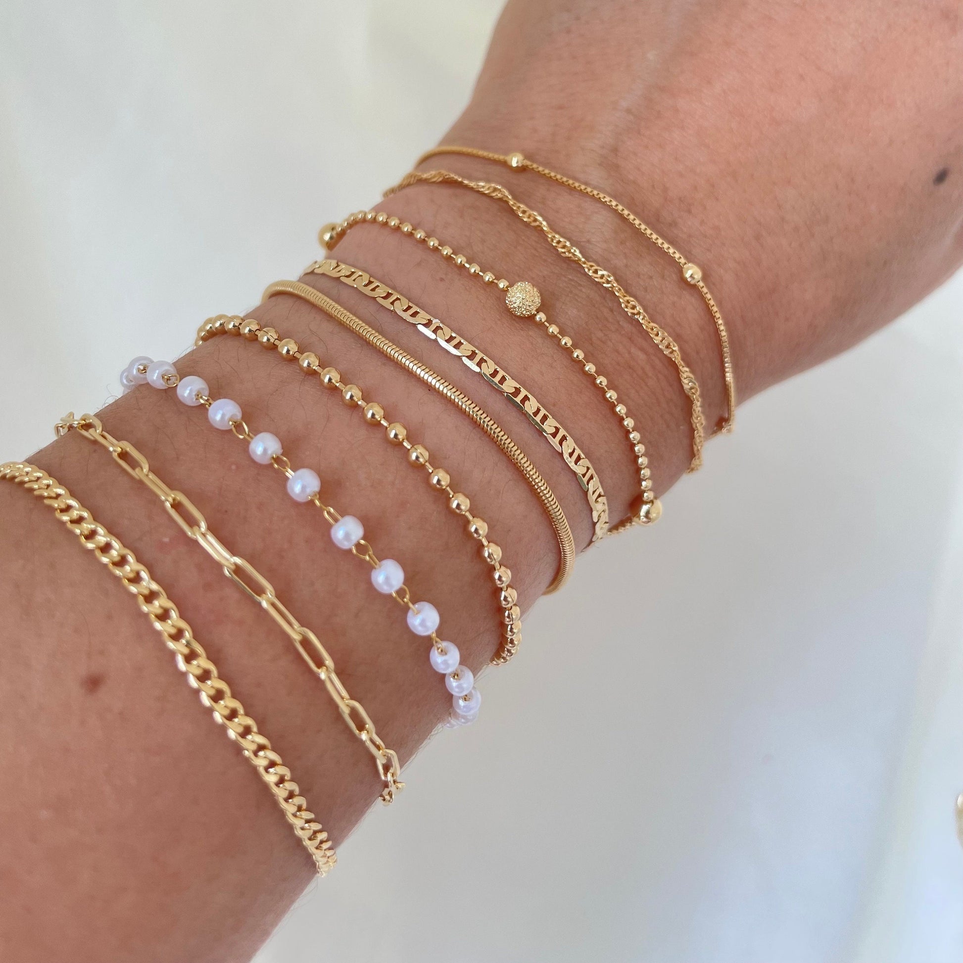 Dainty bracelets, satellite chain, singapur chain, beaded satellite bracelet, mariner bracelet, snake bracelet, beaded bracelet, pearl bracelet, paperclip bracelet, curb chain bracelet all in 18k gold filled, luxury shot