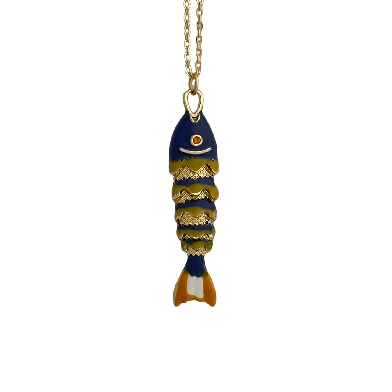 Dark blue, green, and orange enamel fish, white background.