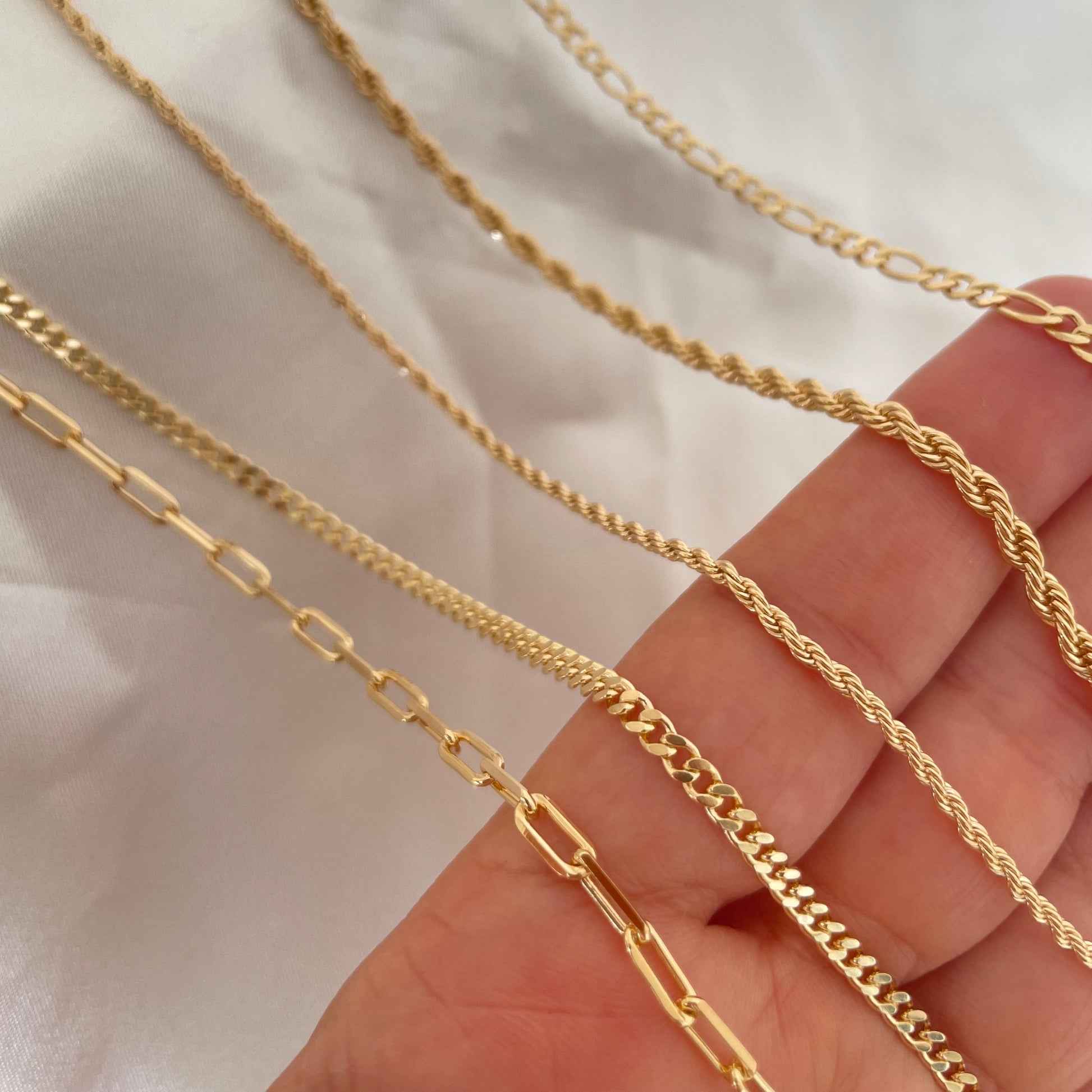 Gold filled Layered Necklace in different styles Paperclip, Curb Chain, Rope, and Figaro.