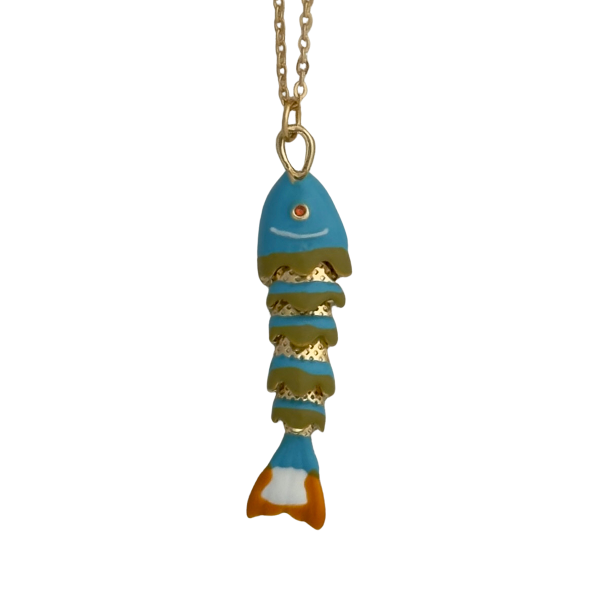 Light blue, green, and orange enamel fish, white background.