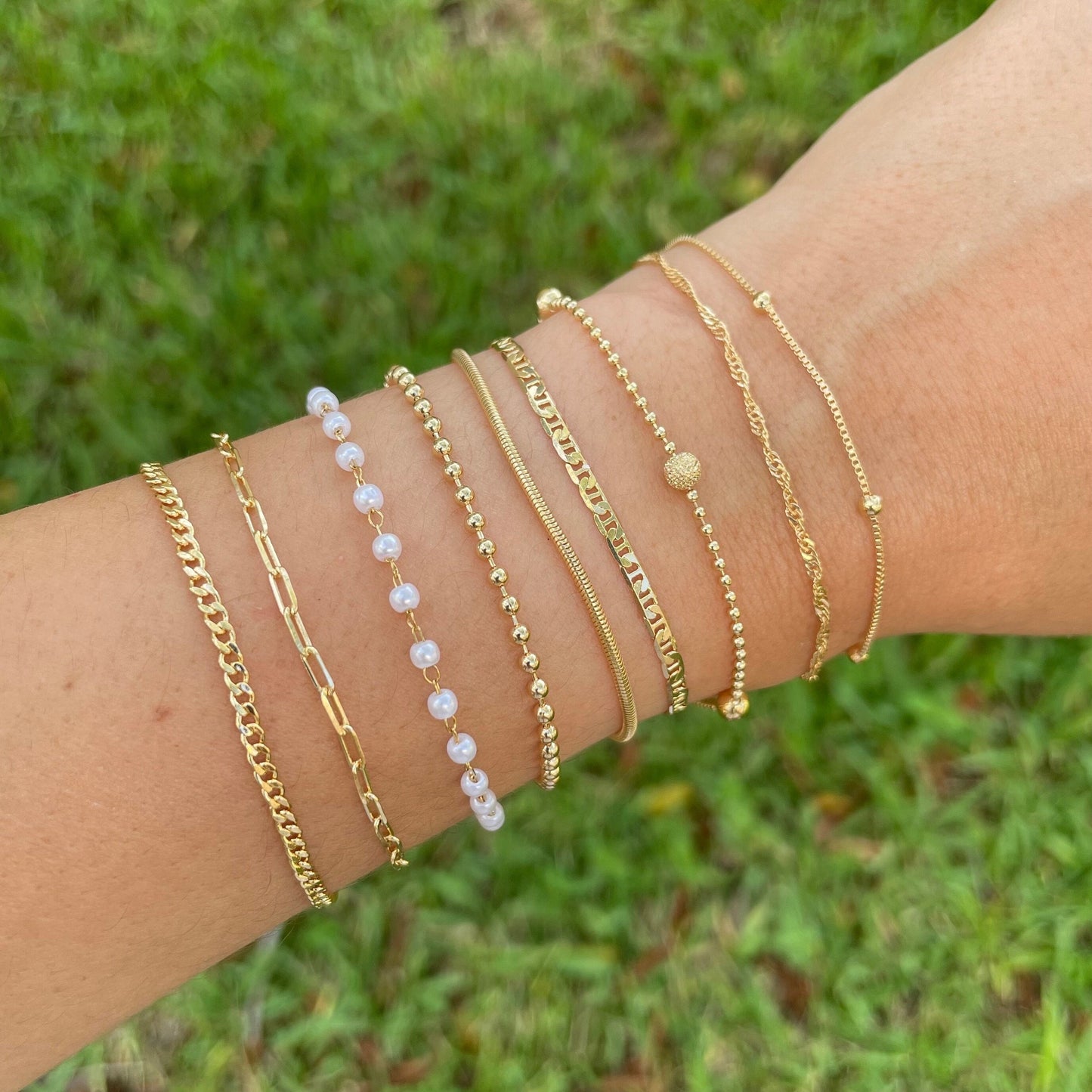 Dainty bracelets, satellite chain, singapur chain, beaded satellite bracelet, mariner bracelet, snake bracelet, beaded bracelet, pearl bracelet, paperclip bracelet, curb chain bracelet all in 18k gold filled on wrist