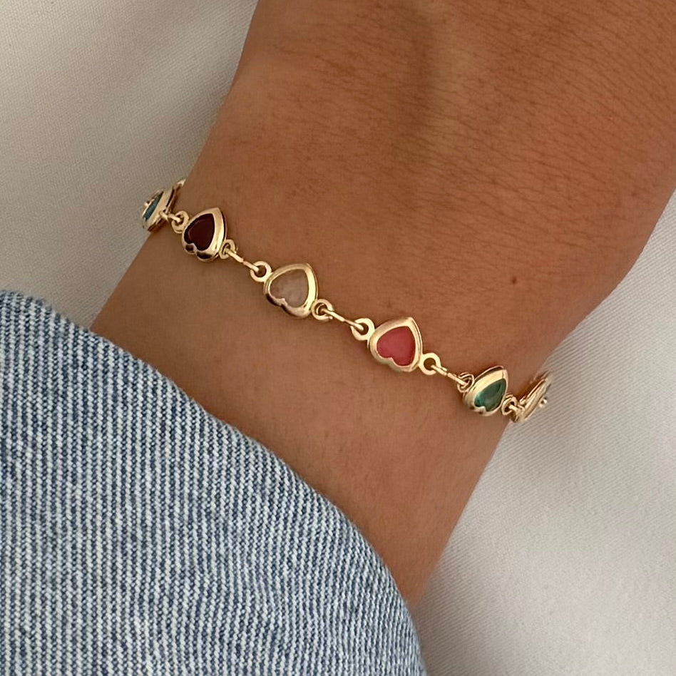 Multicolor heart crystal bracelet with gold filled details on wrist