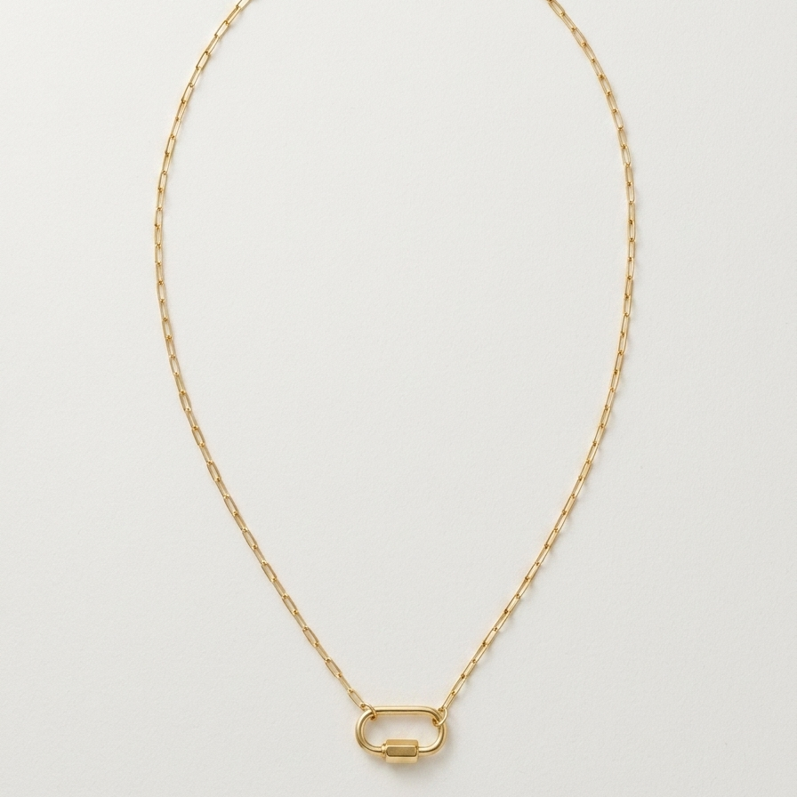 Gold necklace with carabiner middle charm on a white background