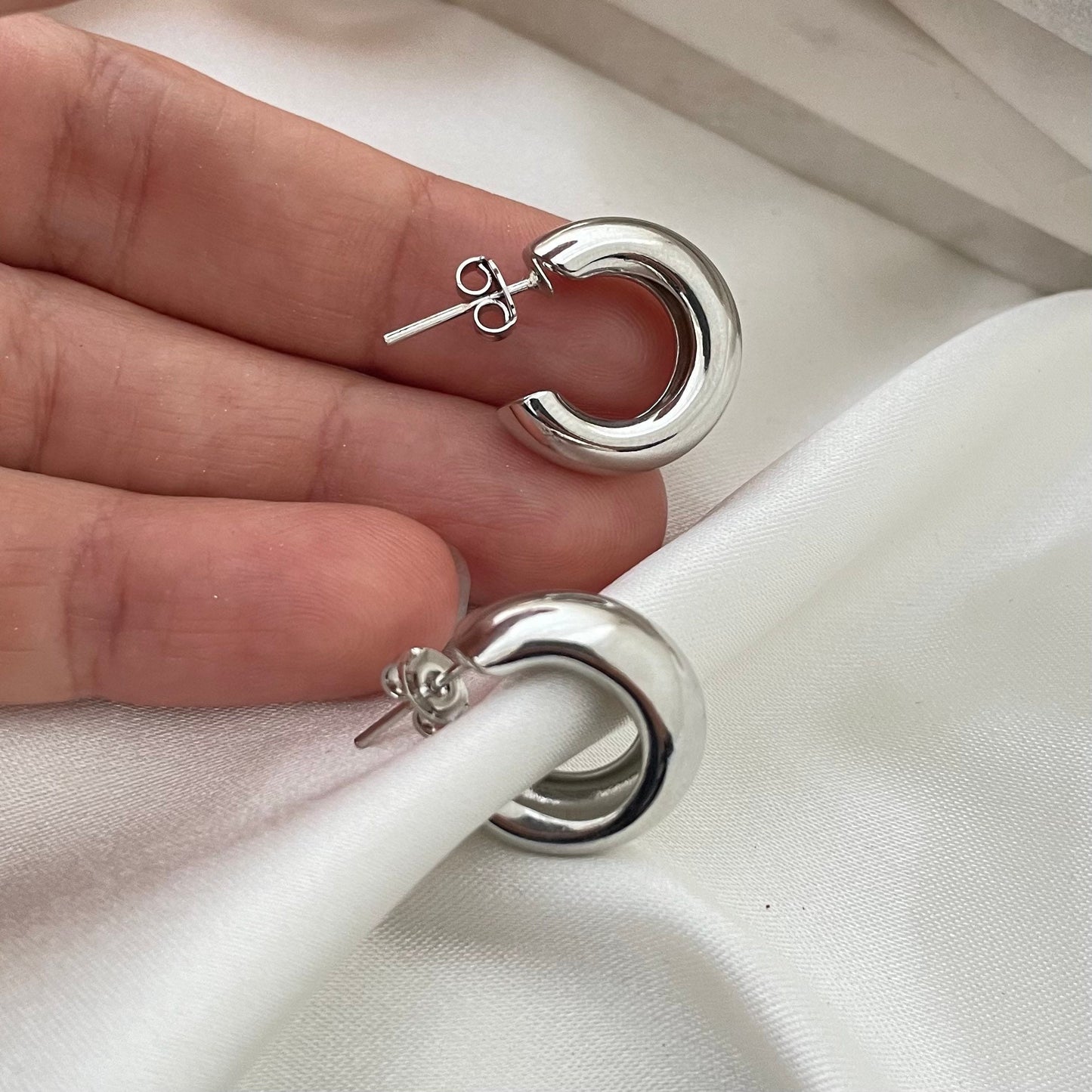 Small tube classic hoop earrings in rhodium filled, c open hoops, thick small hoop