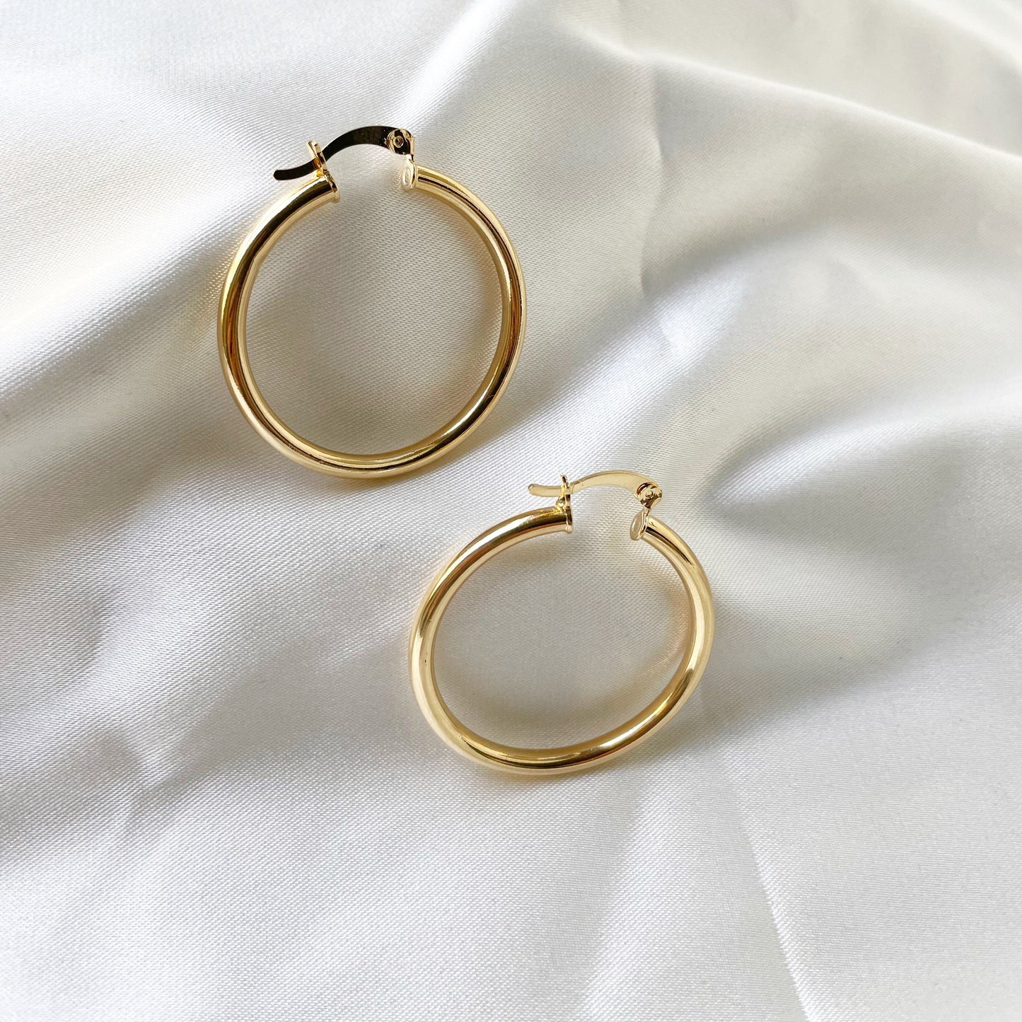 18k gold filled hoop earrings medium size, white background 