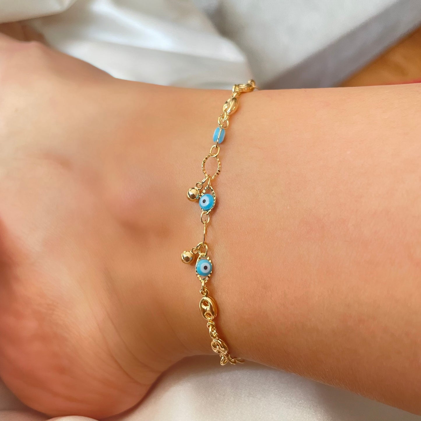 Blue evil eye anklet bracelet in 18k gold filled with dangle bead balls