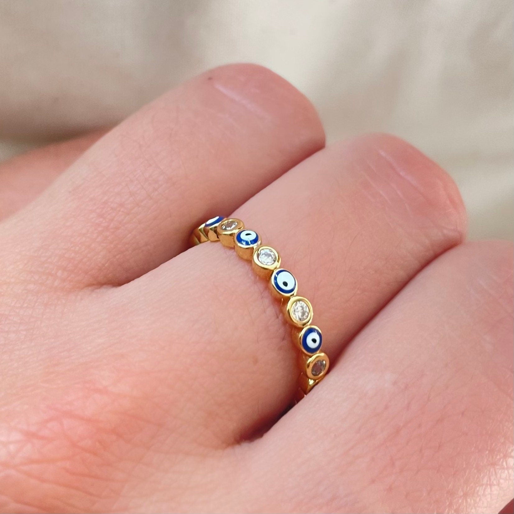 Evil Eye stackable ring in blue gold plated, enamel and cz, wore by model