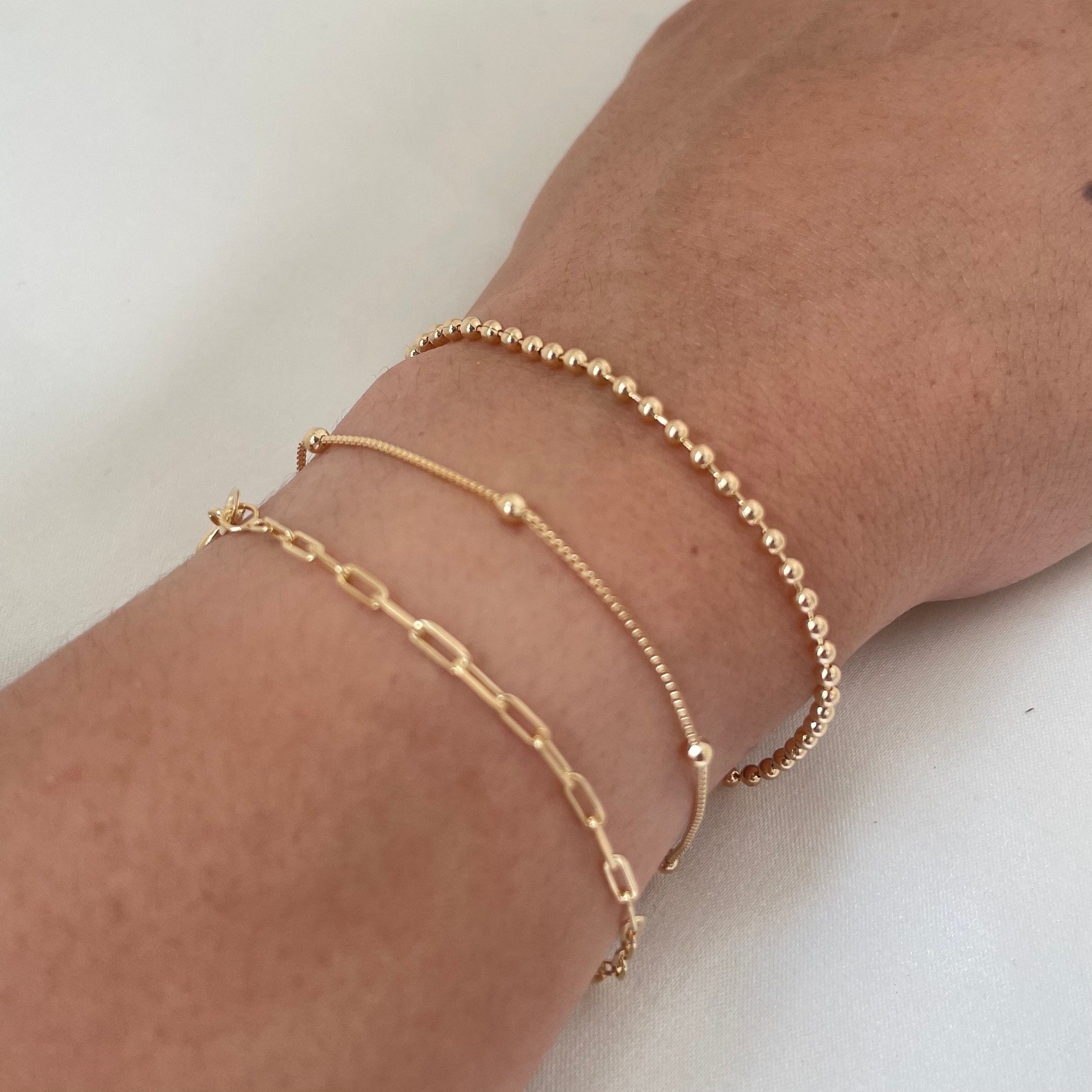 Set of 3 dainty bracelets, paperclip, satellite and beaded bracelet all in 18k gold filled