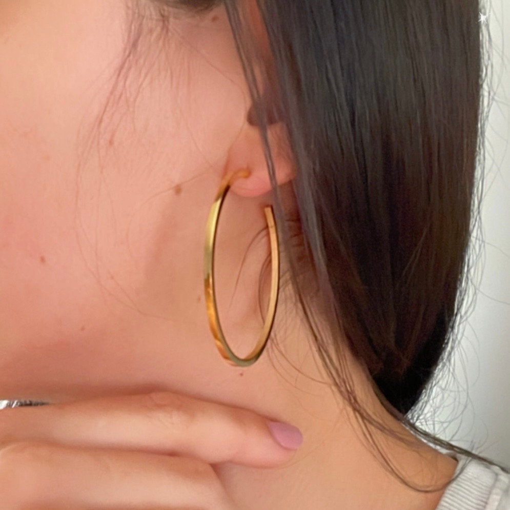 Large Gold Hoop Earrings in stainless steel, hypoallergenic and waterproof, wore by model 