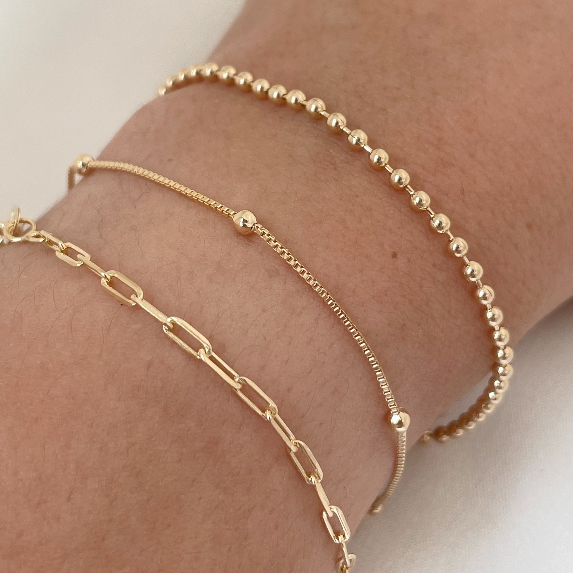 Set of 3 dainty bracelets, paperclip, satellite and beaded bracelet all in 18k gold filled