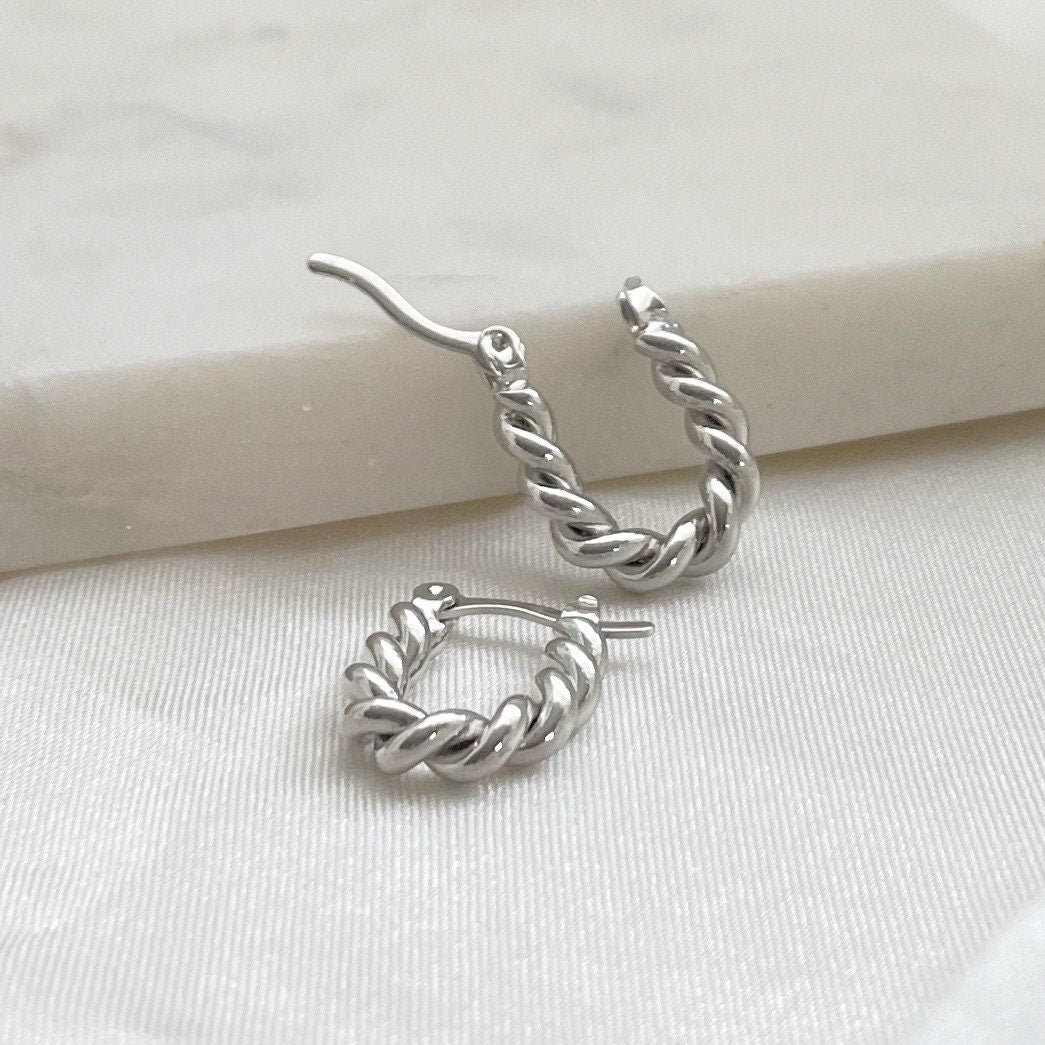 Rhodium filled hoop earrings.