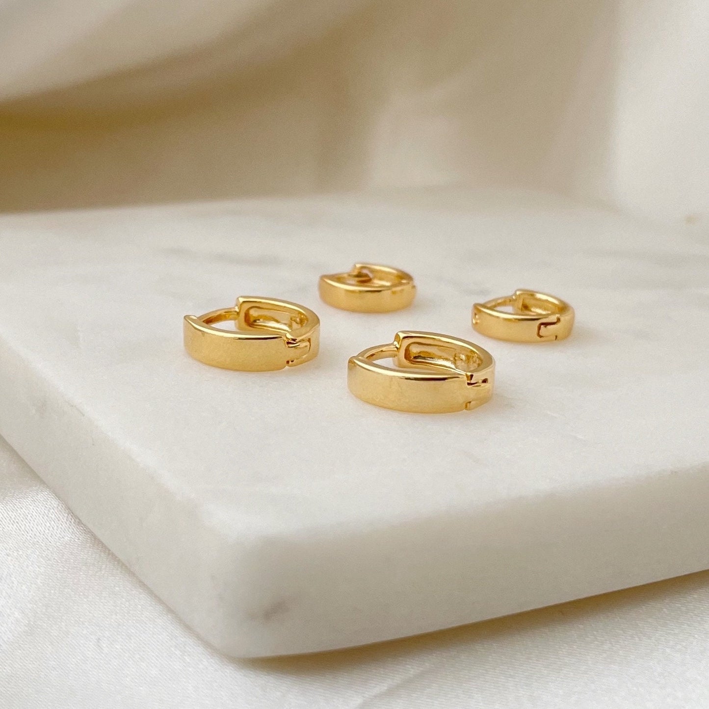 Set of two everyday huggie hoop earrings in 18k gold filled