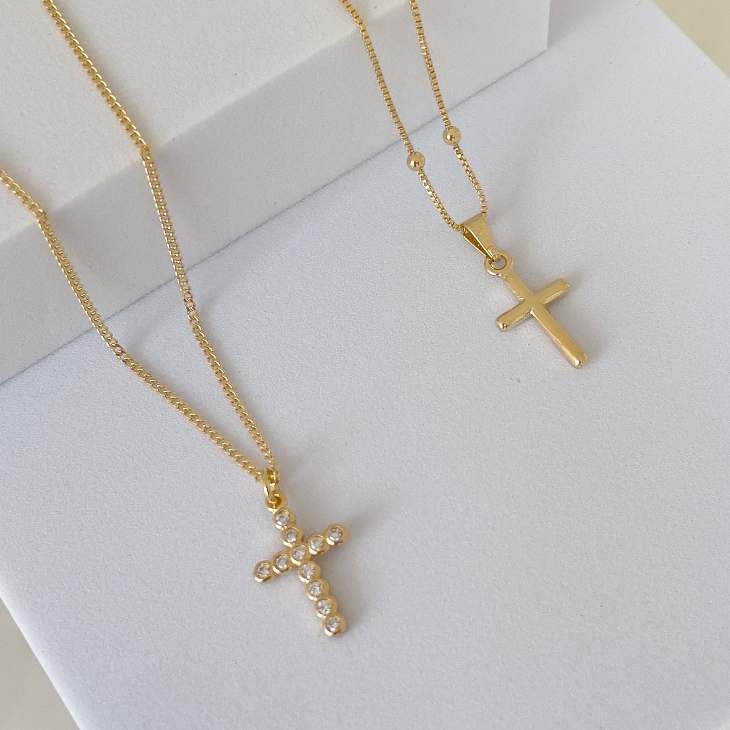 Cross Necklace, plain cross pendant and cz cross pendant. Materials: 18k gold filled and cz, white matte background